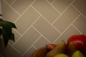Six3Tile_KitchenBacksplash3x6HerringboneAccessibleBeige_CloseUp